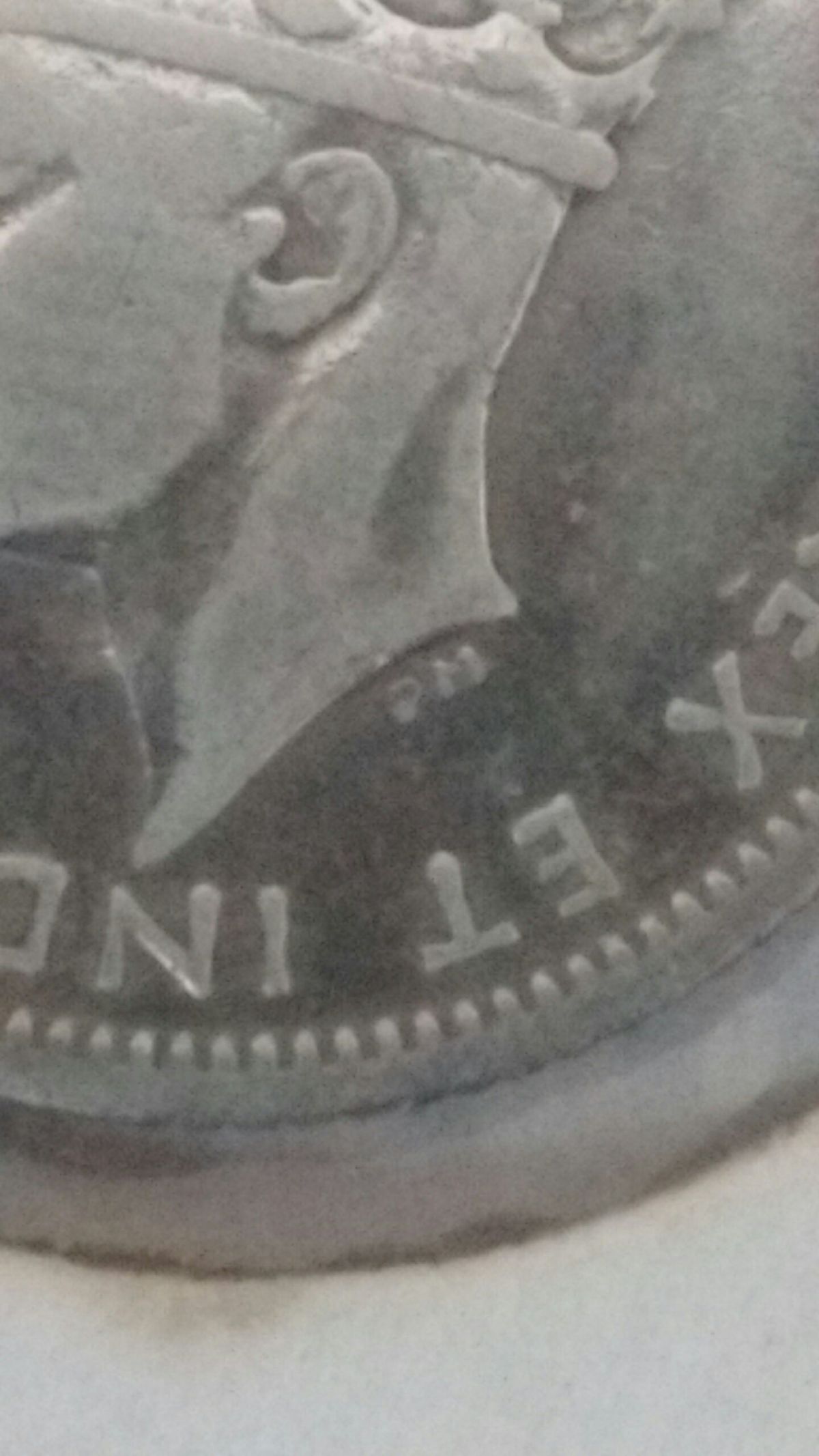 1941-NFLD-10-Cent-Triple-Punched?